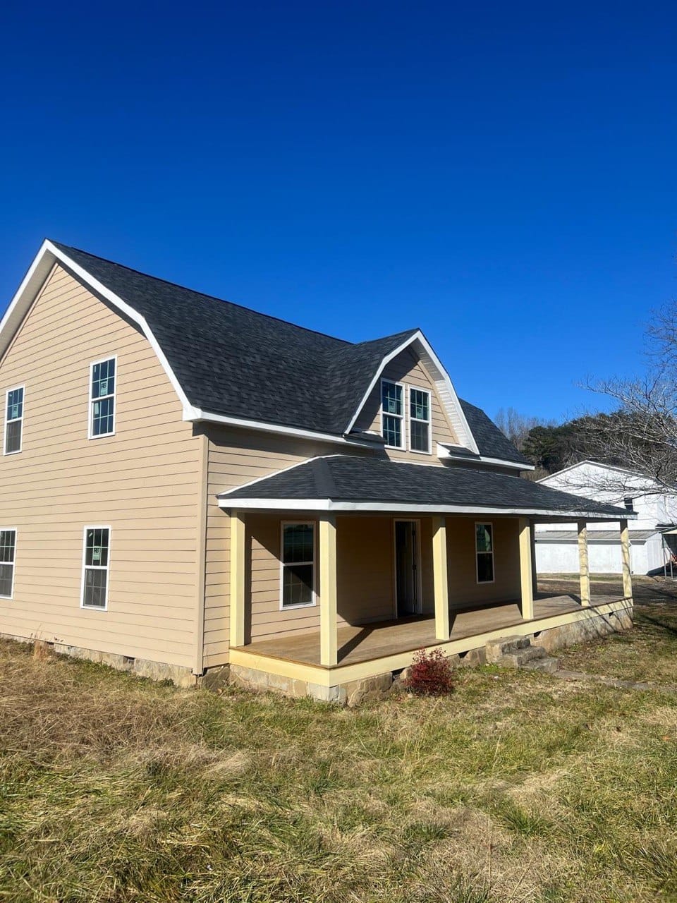 Farmhouse-style siding and deck transformation