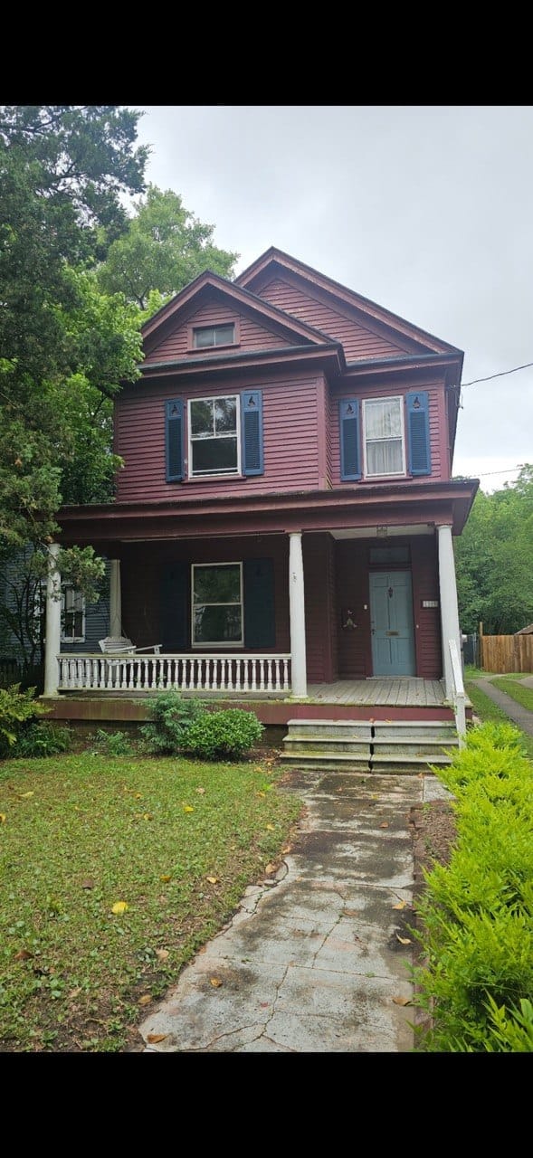 Historic waterfront district home exterior transformation before